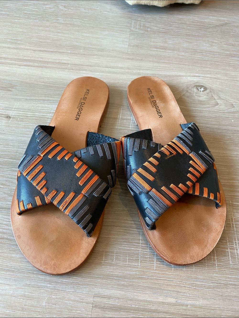 Kelsi Dagger Black Leather Slides with Orange Stitching